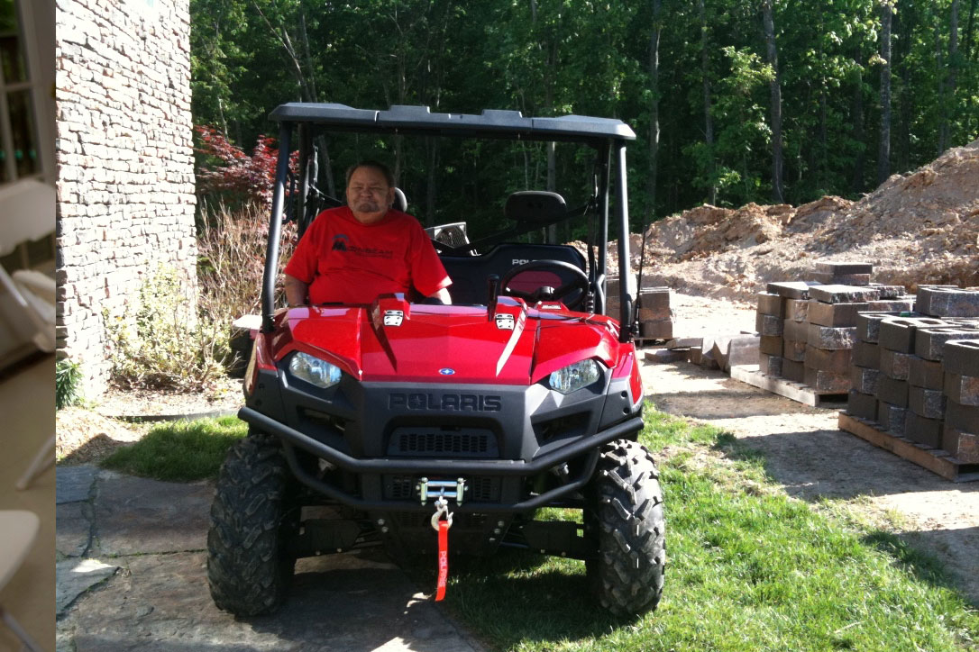 Dad on a Polaris Ranger at Richard and Christy's house